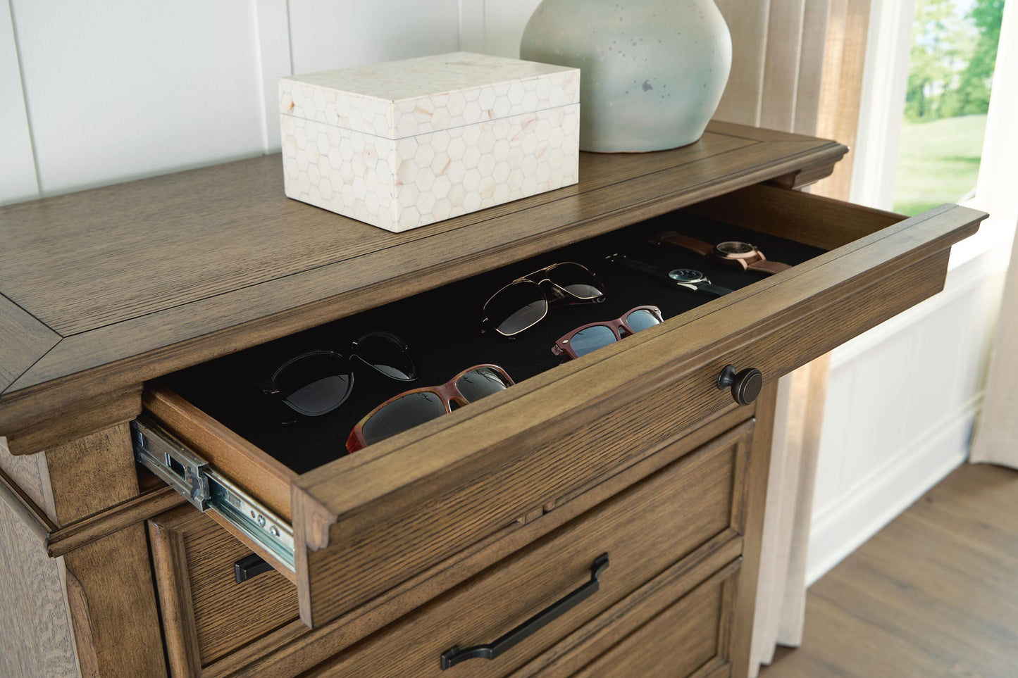 Karallin - Seven Drawer Chest - Medium Brown