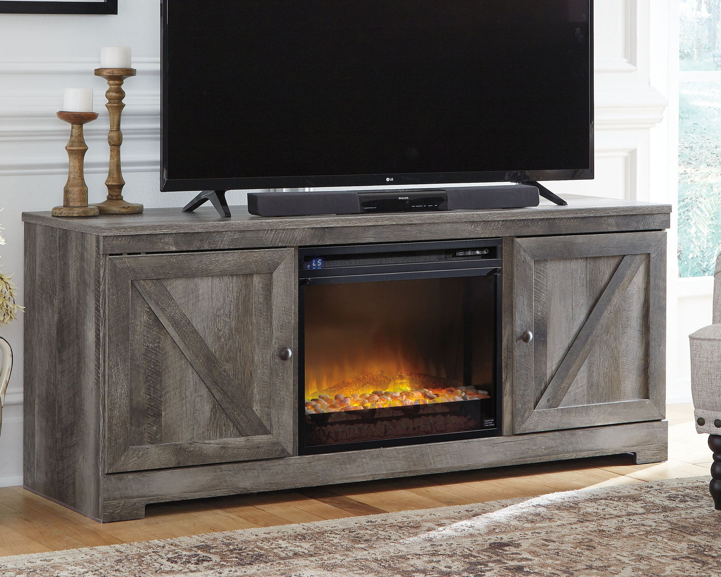 Wynnlow - 63" TV Stand With Glass/Stone Fireplace Insert - Gray