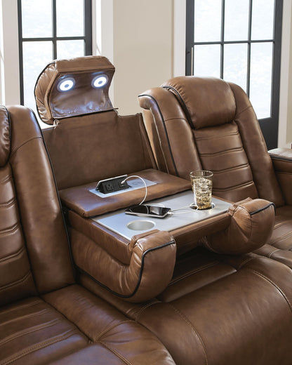 Gruaro - Power Reclining Sofa With Adjustable Headrest - Amber