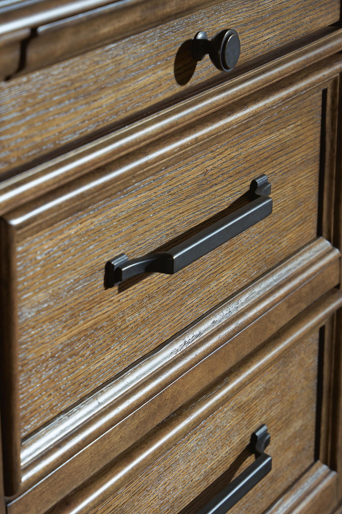 Karallin - Seven Drawer Chest - Medium Brown