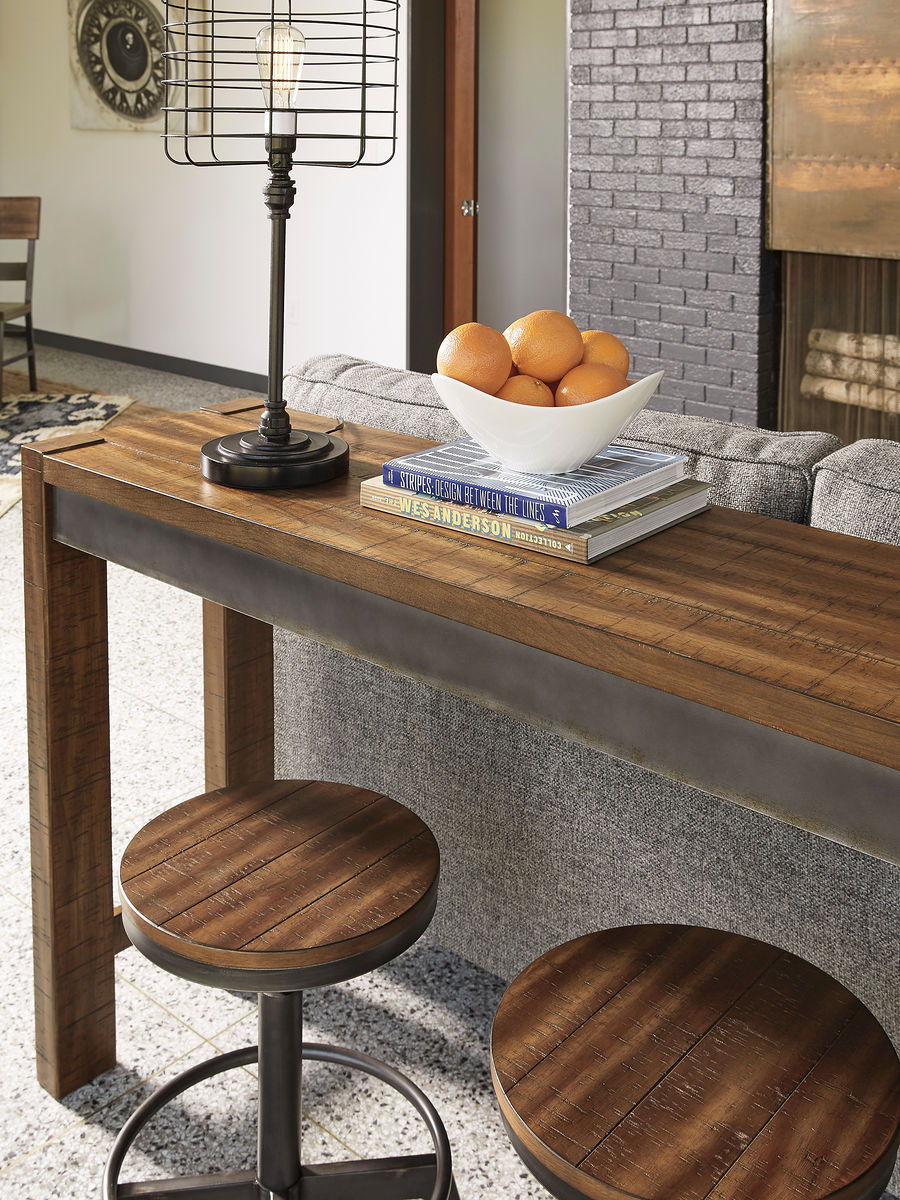 Torjin - 3 Pc. - Long Counter Table, 2 Stools - Dark Brown