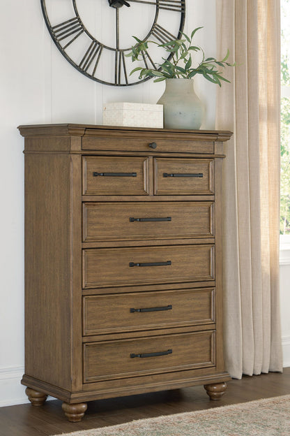 Karallin - Seven Drawer Chest - Medium Brown
